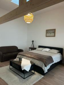 Postel nebo postele na pokoji v ubytování Maison Colmar, spacieuse, accueillante , confortable au calme