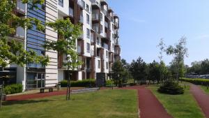 Vonkajšia záhrada v ubytovaní Apartamenty Olympic Park