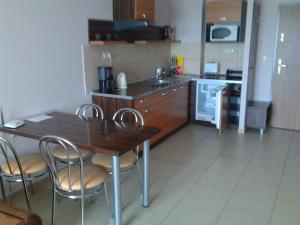 Kuchyňa alebo kuchynka v ubytovaní Apartamenty Olympic Park