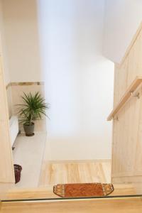 a rug on the floor in a room with a staircase at Szarotka in Bukowina Tatrzańska +57 photos
