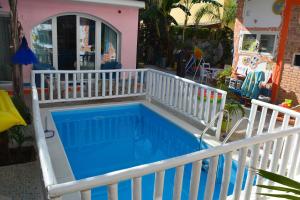 a swimming pool with a white rail around it at Casa Carolina in Agropoli