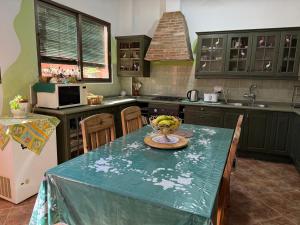 Η κουζίνα ή μικρή κουζίνα στο Madre Amada Accommodation Tenerife
