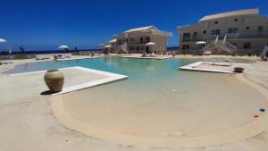 Πισίνα στο ή κοντά στο Hakuna Matata Borgo 84