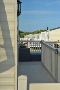 a view of a balcony of a house at Cala Gran Holiday Park - Holiday Accommodation 10830 in Fleetwood