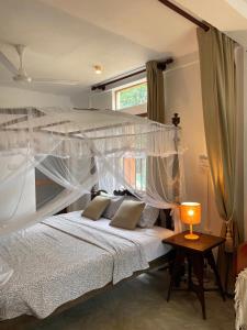 Ένα ή περισσότερα κρεβάτια σε δωμάτιο στο LAKE LOFT - La maison VEDA