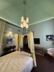 Ένα ή περισσότερα κρεβάτια σε δωμάτιο στο Maison MoDì