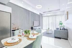 a dining room with a table and chairs at Upscale Condo, Spectacular Views in Santo Domingo