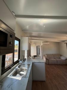 TV a/nebo společenská místnost v ubytování Movil Home rural en Cartagena