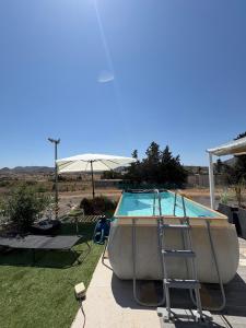 Bazén v ubytování Movil Home rural en Cartagena nebo v jeho okolí + 8 fotografií