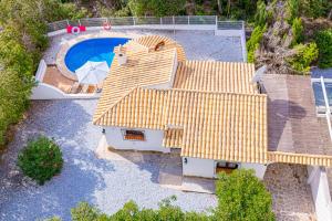 an overhead view of a house with a swimming pool at Villa Abeto in El Tosalet
