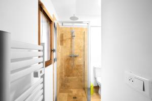 a bathroom with a shower and a toilet at Maison La Plaine, En Périgord in Saint-Laurent-la-Vallée +23 photos