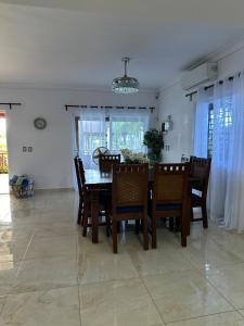 a dining room with a table and chairs at Villa Valentina 