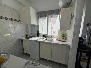 Kuchyň nebo kuchyňský kout v ubytování La casita de Omar en el corazón del Puerto de la Cruz + 31 fotografií