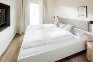 Ένα ή περισσότερα κρεβάτια σε δωμάτιο στο meer suite juist 6 - mit Wattblick