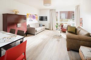 Μια τηλεόραση ή/και κέντρο ψυχαγωγίας στο Haus Seute Deern - Whg. Bilge