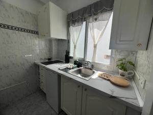 Kuchyň nebo kuchyňský kout v ubytování La casita de Omar en el corazón del Puerto de la Cruz