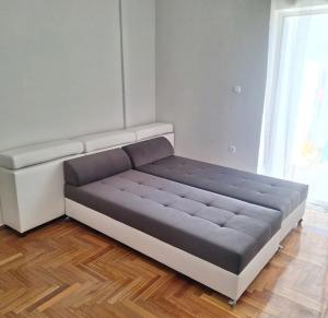 a large bed in a room with at MARIAS APARTMENT SMART KEY BOX by WESTBOOKING GR in Agrinio