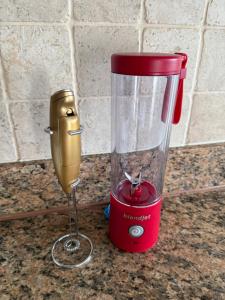 a red blender sitting on top of a counter at Cozy Gurnee Home Near Six Flags and Base in Gurnee