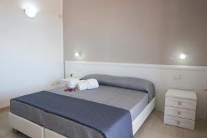 Postel nebo postele na pokoji v ubytování Raggio Di Sale