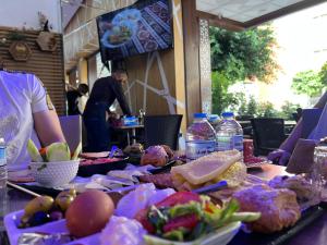 a table with a bunch of food on it at STUDIO HIGH LuX 01 in Tangier +13 photos