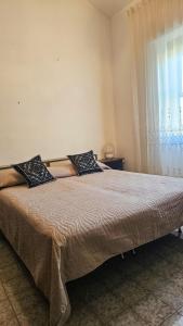 Katil atau katil-katil dalam bilik di Casa Bianca Villaputzu +8 gambar