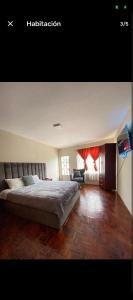 Ένα ή περισσότερα κρεβάτια σε δωμάτιο στο Home Austro loja