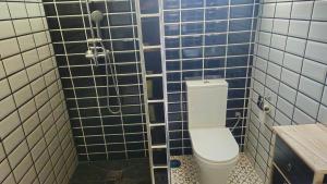 Koupelna v ubytování Optimus Studio Esturión + 12 fotografií