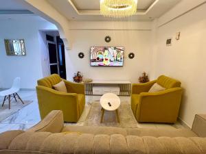 Posezení v ubytování Classic one bedroom apartment in mombasa CBD + 2 fotografie