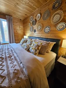 Katil atau katil-katil dalam bilik di Chalet Natûr