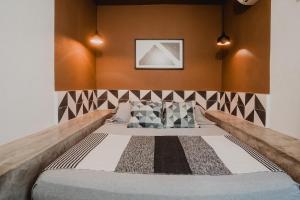 a bedroom with a large bed in a room at Casa Sayula Home Cerca De Playa y Centro in Sayulita