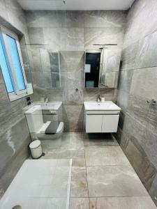 Koupelna v ubytování Casa Élan + 8 fotografií