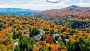 an autumn view of a town in the mountains at Notchbrook 17ABC in Stowe