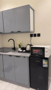 Η κουζίνα ή μικρή κουζίνα στο شقة استديو في حي الوزارات +9 φωτογραφίες