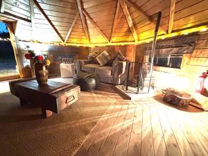 Istumisnurk majutusasutuses Hobbit Haven Hot Tub and Countryside Bliss