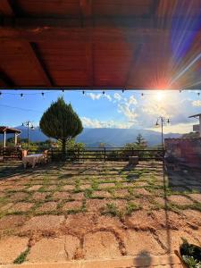 a view of the mountains from the patio of a house at I colori dell'orizzonte in Santo Stefano +11 photos