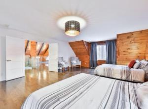 Postel nebo postele na pokoji v ubytování Chalet Bluesky-Chertsey