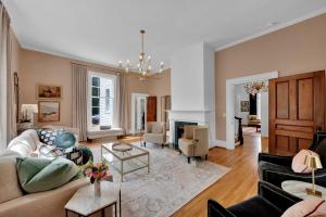 a living room with a couch and a table at Eighty Oaks, Jacksonville, AL in Jacksonville