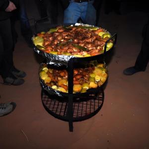 two trays of food sitting on top of a table at Volta Desert Camp in Wadi Rum