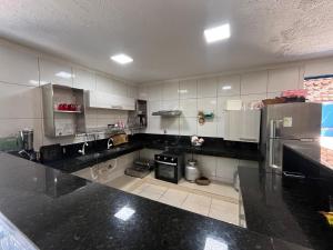 Køkken eller tekøkken på Chacará Village do Rio Ouro