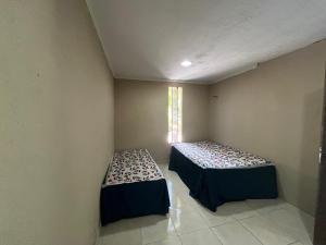 En eller flere senge i et værelse på Chacará Village do Rio Ouro + 38 billeder