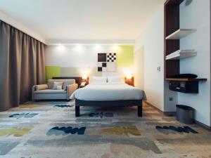 Кровать или кровати в номере ibis Styles Warszawa Airport