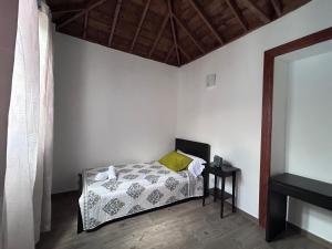 Ένα ή περισσότερα κρεβάτια σε δωμάτιο στο Casa Noroeste +32 φωτογραφίες