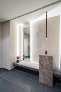 a room with a bed and a mirror at Marina Vacation Homes in Casablanca