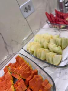 two trays of fruit on a counter top withspectricular at On Park Hotel e Traslado in Guarulhos +38 photos