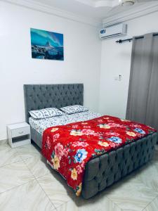 Postel nebo postele na pokoji v ubytování Jawara Kunda Apartments