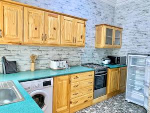 Kuchyň nebo kuchyňský kout v ubytování Jawara Kunda Apartments + 6 fotografií