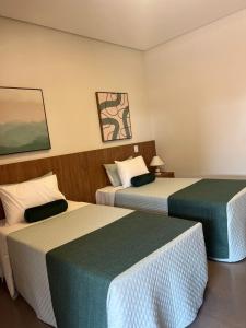 Postel nebo postele na pokoji v ubytování Keko hotel