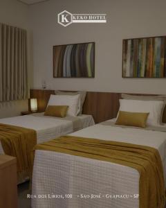 Postel nebo postele na pokoji v ubytování Keko hotel