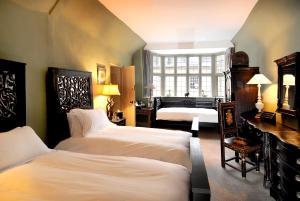 Ein Zimmer in der Unterkunft The Bull And Swan