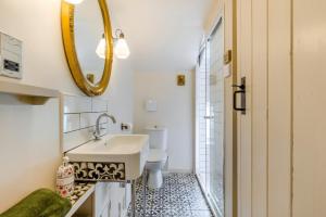 a bathroom with a sink and a mirror at 2 Bed in Colkirk oc-j33005 in Colkirk +23 photos